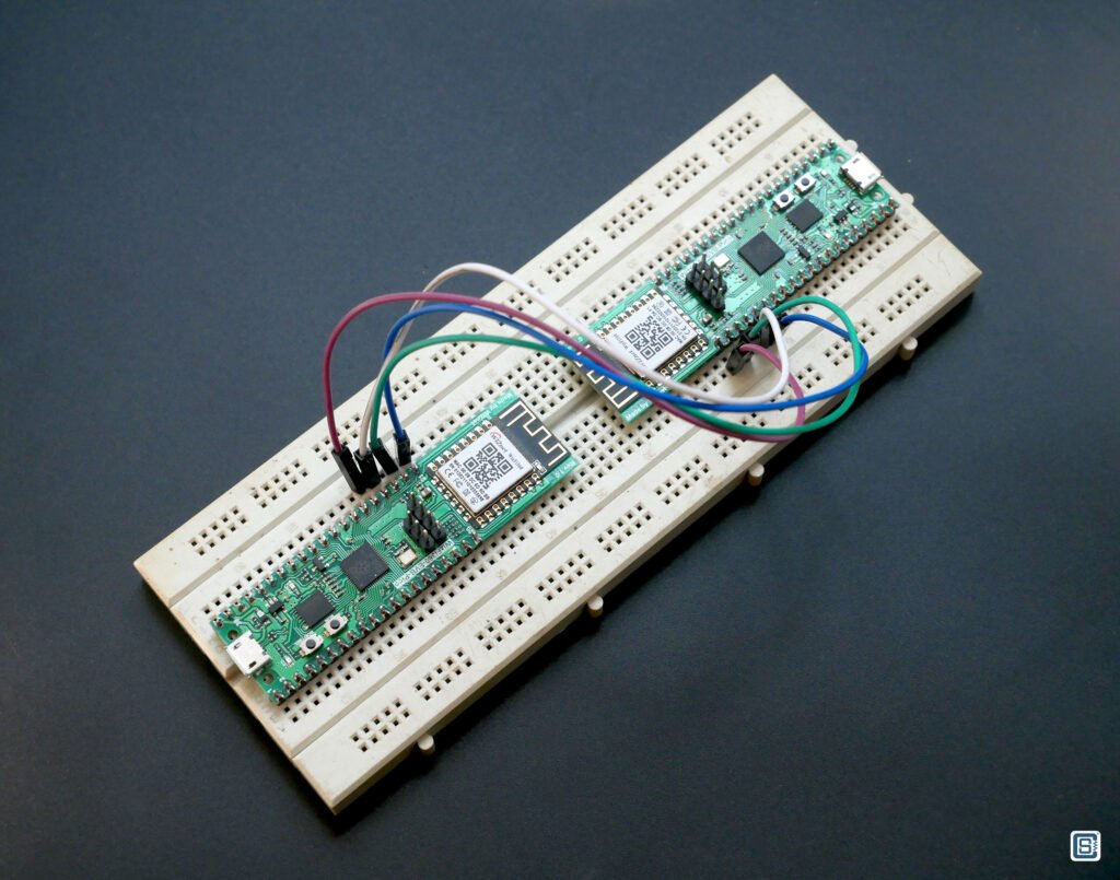 Two WizFi360-EVB-Pico boards placed on a breadboard